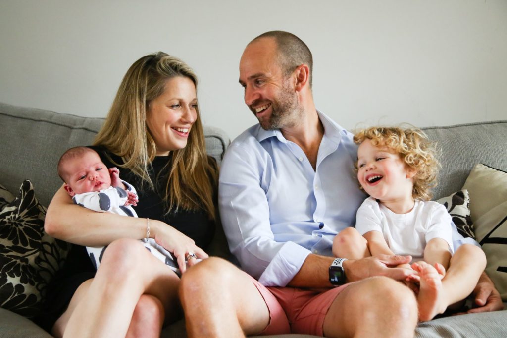 Photo of a happy family during an at home photo shoot by Tanya Aldcroft Photography