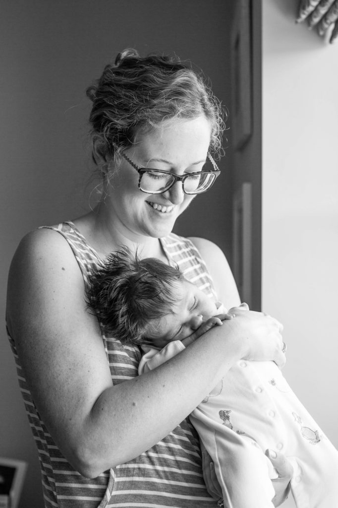 Newborn baby girl with Mummy at a home photo session, Tring, Hertfordshire
