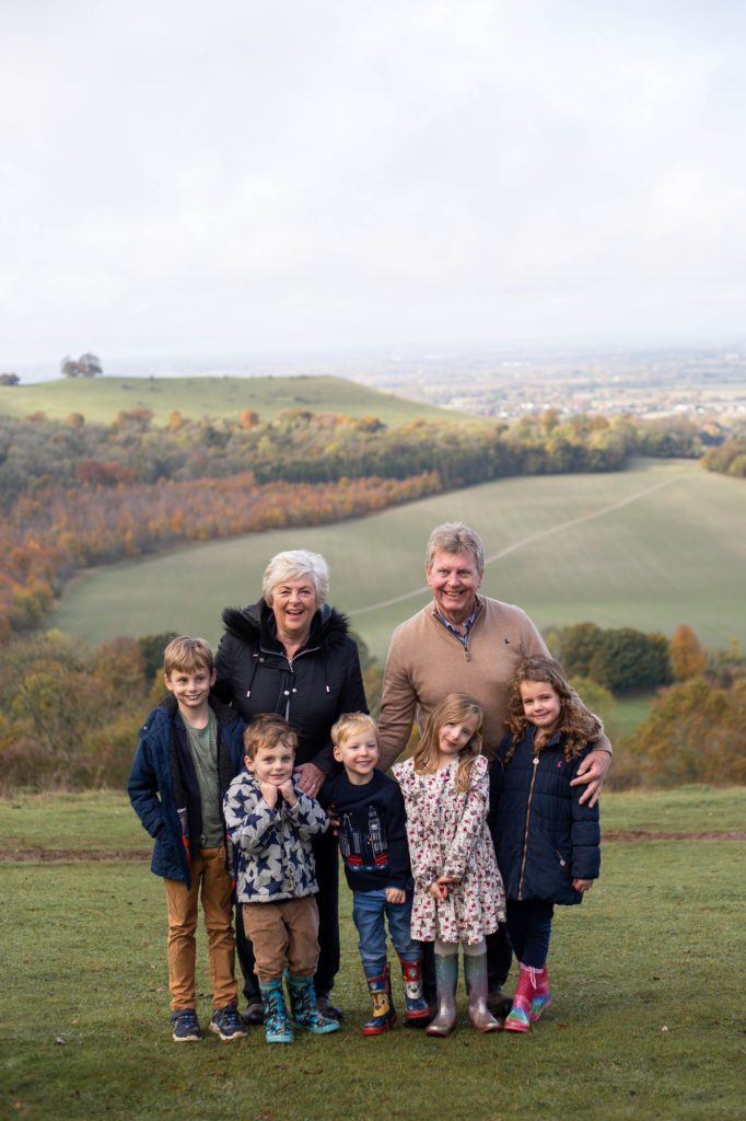 Grandparents and grandchildren at an autumn family photo shoot at Coombe Hill, near Wendover in Buckinghamshire