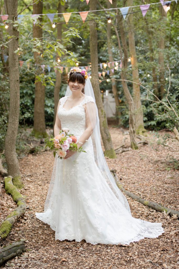 Bride at wedding ceremony, Woodland Weddings near Tring, Hertfordshire